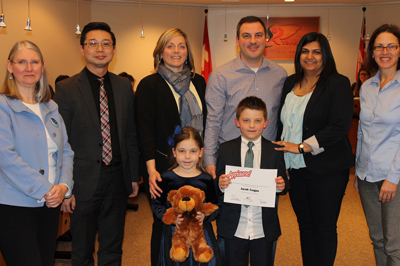 Cornell Village Public School Student Jacob Tzogas with Board representatives