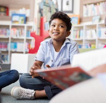 Students listening to book being read