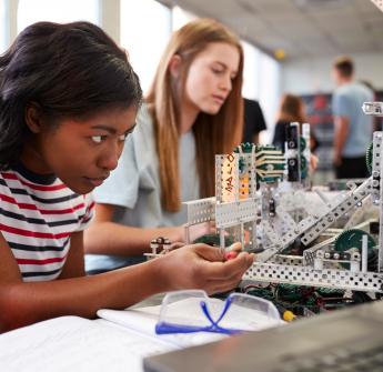 Students working on mechanics