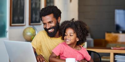 Parent and Child on laptop