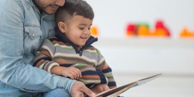 Parent and child reading book