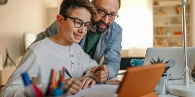 Student with parent on computer