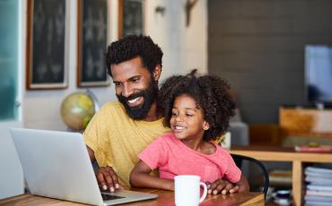 Parent and Child on laptop