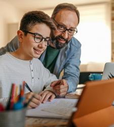 Student with parent on computer